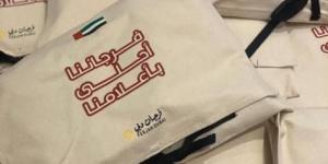 «فرجان دبي» توزع 500 علم