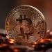 "بيتكوين" تتراجع دون 80,000 دولار بفعل توقعات رفع الفائدة الأمريكية
